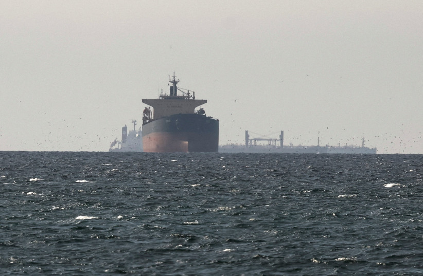 Tankers sail in the Gulf, near the Strait of Hormuz, as seen from northern Ras al-Khaimah, near the border with Oman’s Musandam governance, amid the US-Israeli conflict with Iran, in United Arab Emirates, March 11, 2026.