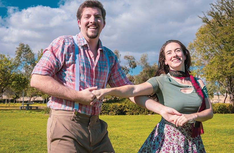 Noah Herman as factory superintendent Sid Sorokin and Lexi Leitner as Babe Williams, the union rep, in ‘The Pajama Game’ (see Sunday). (credit: LOGON)