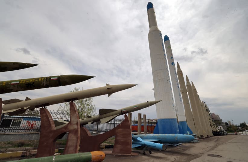 Mockups of domestically-made Iranian missiles are displayed at an exhibition outside the Defence Museum in Tehran on March 31, 2026.