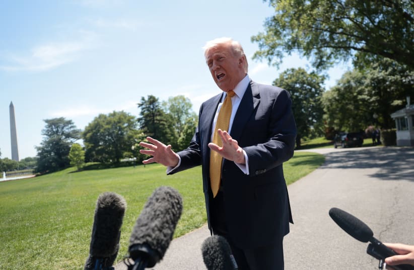 US President Donald Trump speaks to the press, ahead of departing the White House for Joint Base Andrews en route to Beijing, China, in Washington, DC, US, May 12, 2026. 