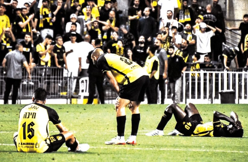 Beitar Jerusalem players after their title hope ended.