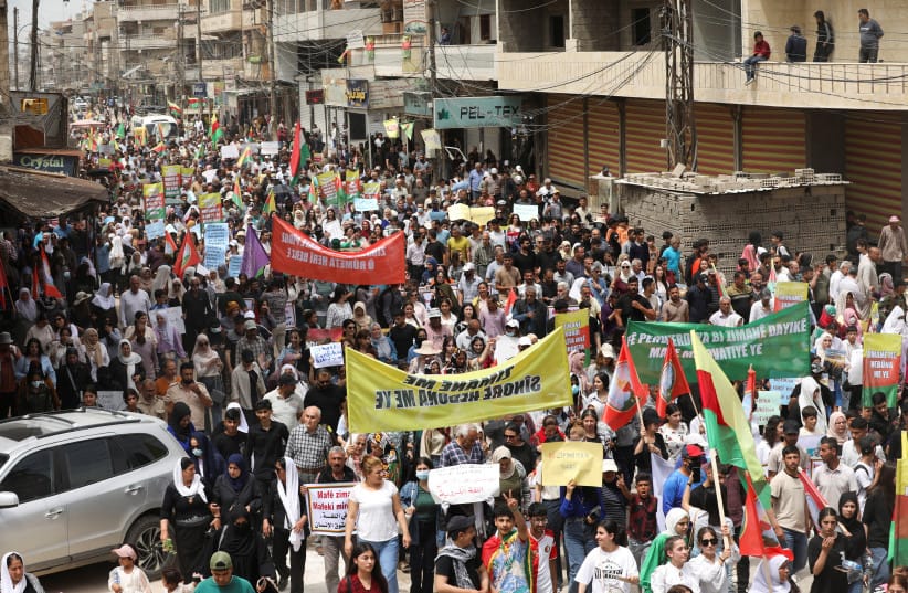 Syrian Kurds demonstrate to mark Kurdish Language Day, demanding constitutional recognition of the Kurdish language by the Syrian government, in Qamishli, Syria, May 14, 2026.