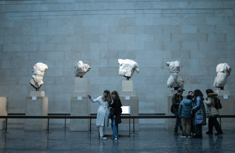 Visitors view the Parthenon Marbles, also known as the Elgin Marbles, at the British Museum in London on December 10, 2024.