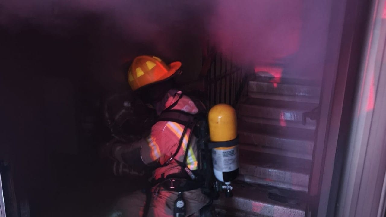 Israeli Firefighters work to rescue residents and contain a fire in an 8-story building in Lod. May 30, 2026.