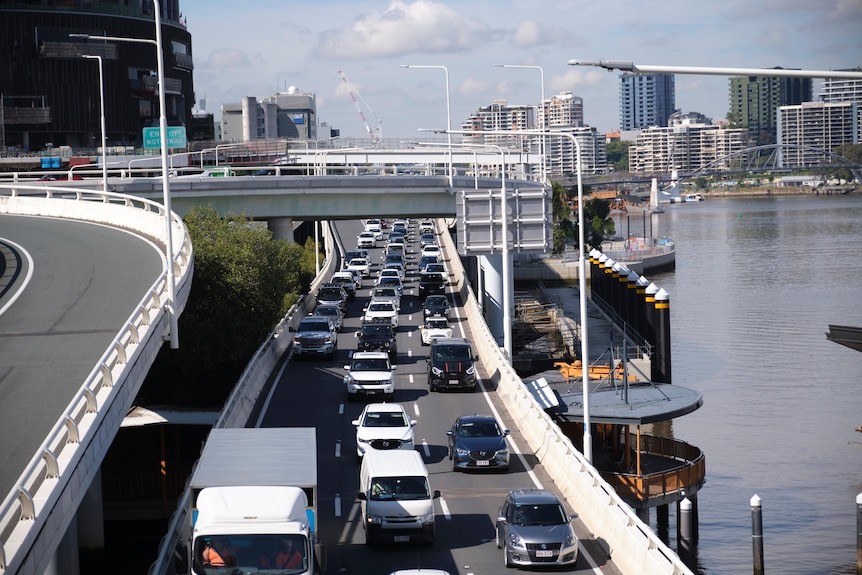 Traffic beside the river.