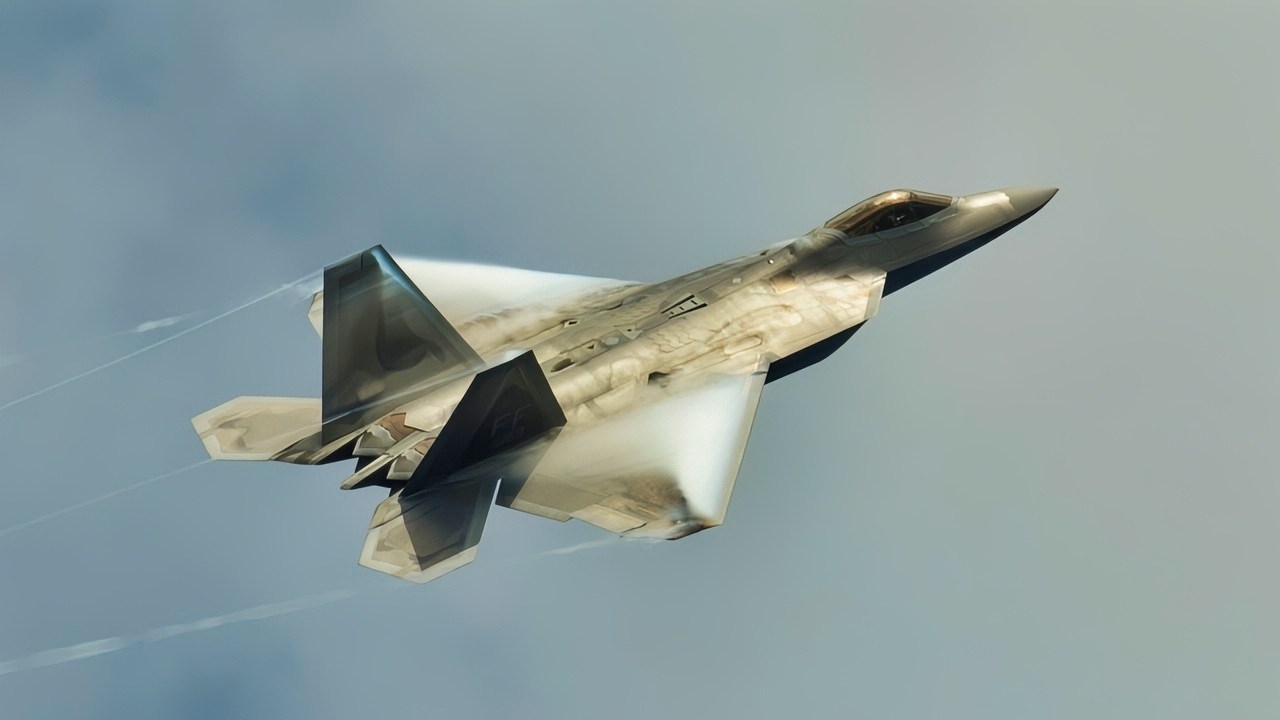 A U.S. Air Force F-22A Raptor aircraft assigned to the 27th Expeditionary Fighter Squadron flies above the guided missile destroyer USS Preble (DDG 88), not pictured, during an air defense exercise in the Philippine Sea Sept. 24, 2013. The Preble was part of the George Washington Carrier Strike Group and was underway in the U.S. 7th Fleet area of responsibility supporting maritime security operations and theater security cooperation efforts. (U.S. Navy photo by Mass Communication Specialist 3rd Class Paul Kelly/Released)