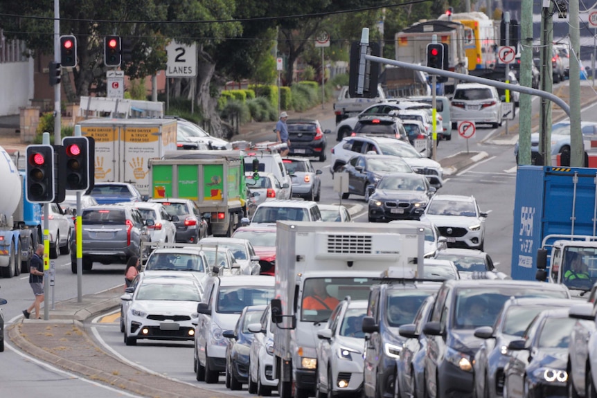 Cars stalled in morning peak hour traffic in Annerley, Brisbane