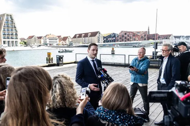 Greenland Prime Minister Jens-Frederik Nielsen wasn't warmed by Landry's offer of cookies to the local children.
