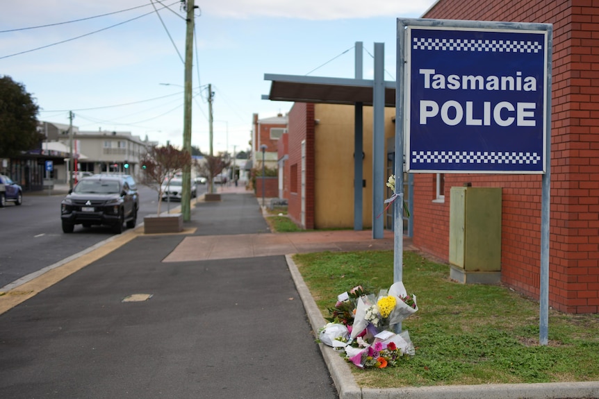 Flower tributes outside Ulverstone police station