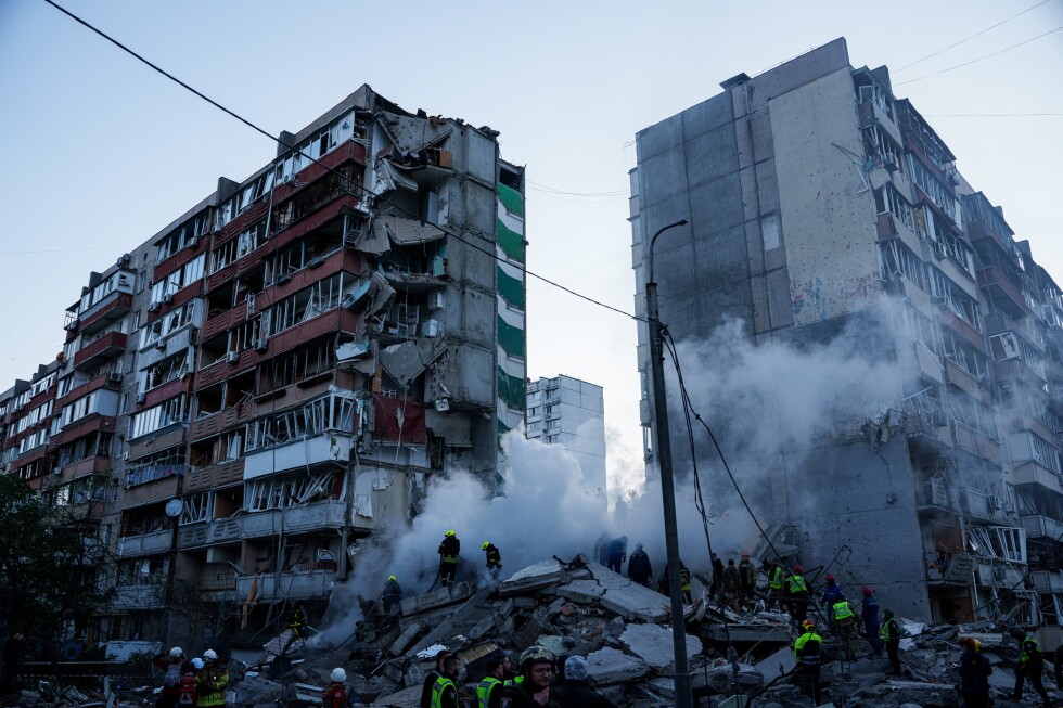 Russia hammers Ukraine, flattening a Kyiv apartment block in deadly attack