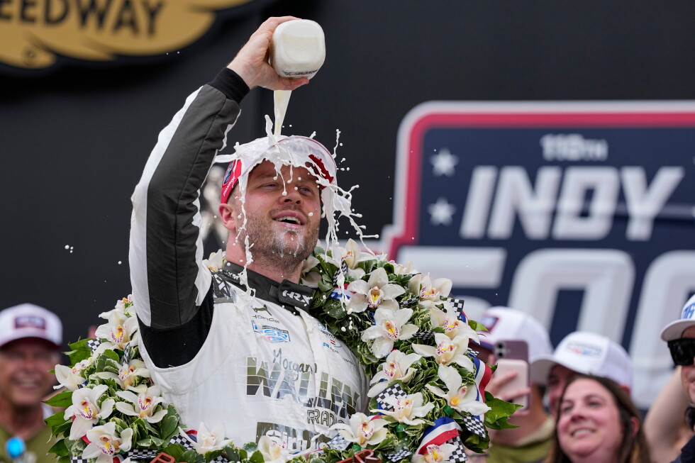 Rosenqvist speeds past Malukas to win the closest Indy 500 in history