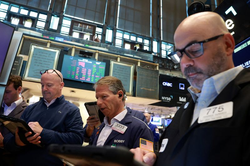 Wall Street mixed, European stocks gain as Broadcom drags tech; oil dips