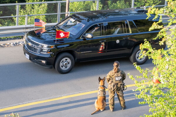 A convoy with U.S. Vice President JD Vance arrives at the Bürgenstock Resort in Obbuergen, near Lucerne, in Switzerland Sunday, June 21, 2026. (Urs Flueeler/Keystone, Pool Photo via AP)