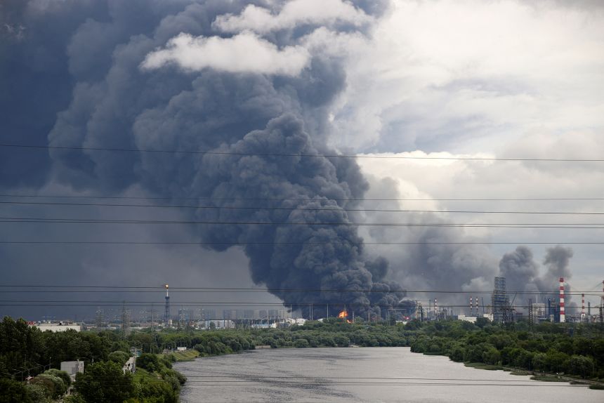 Thick plumes of smoke rise from an oil refinery on the outskirts of Moscow following a Ukrainian drone attack on June 18, 2026, in this picture obtained from social media.