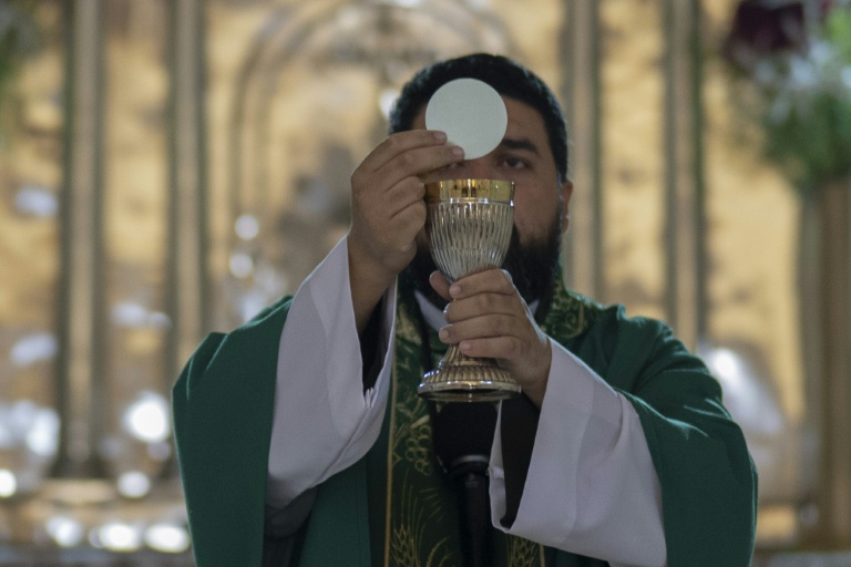 Bitter communion: Cuban priests ordered to ration mass wafers