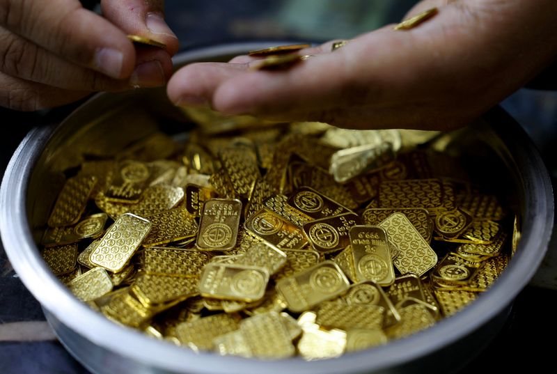 Gold eases on stronger oil as fresh Mideast hostilities erupt