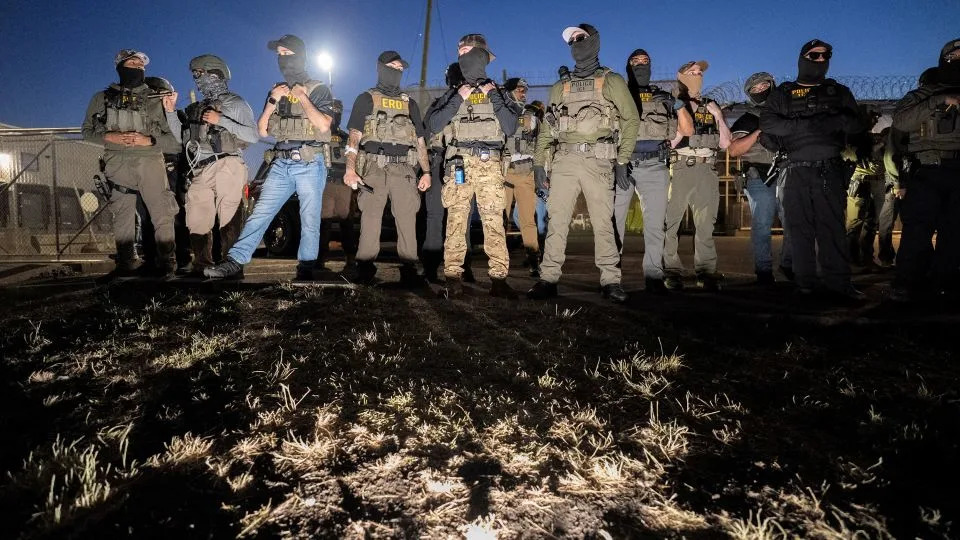ICE agents and Enforcement and Removal Operations (ERO) officers stand guard outside Delaney Hall detention facility after multiple clashes with protestors last month. - David Dee Delgado/Reuters