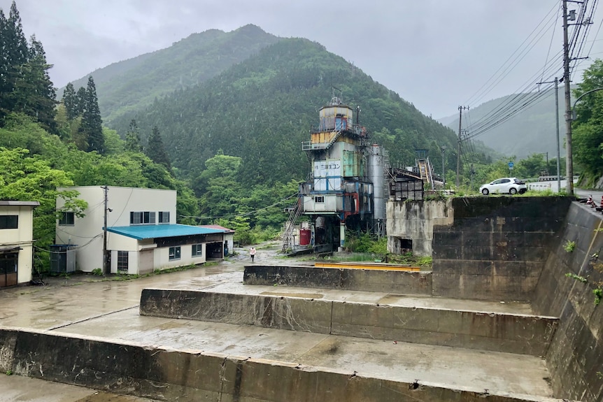 An industrial building stands abandoned in the Iya Valley.