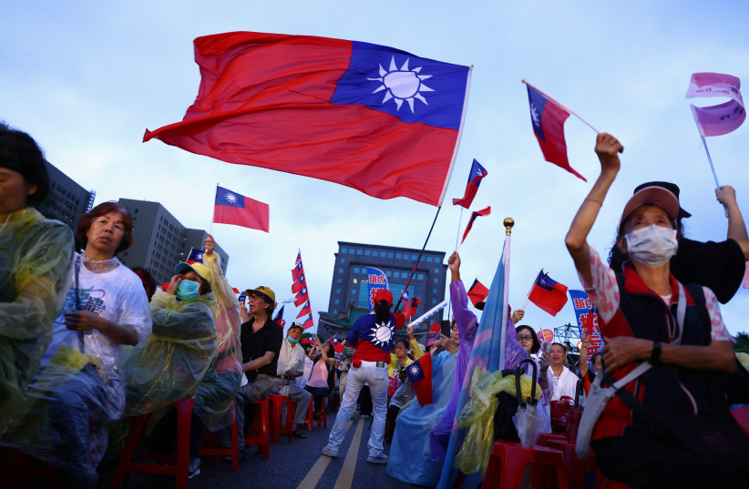 Supporters of Kuomintang (KMT) party attend a rally against the recall campaign ahead of Saturday's vote for lawmakers, in Taipei, Taiwan July 25, 2025.
