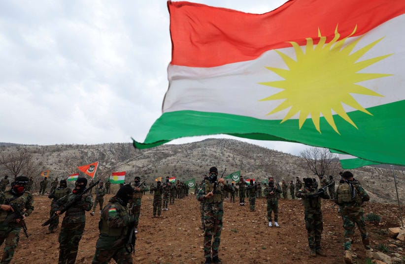 Iranian Kurdish fighters from the Kurdistan Freedom Party (PAK) take part in a training session at a base on the outskirts of Erbil, Iraq February 12, 2026.