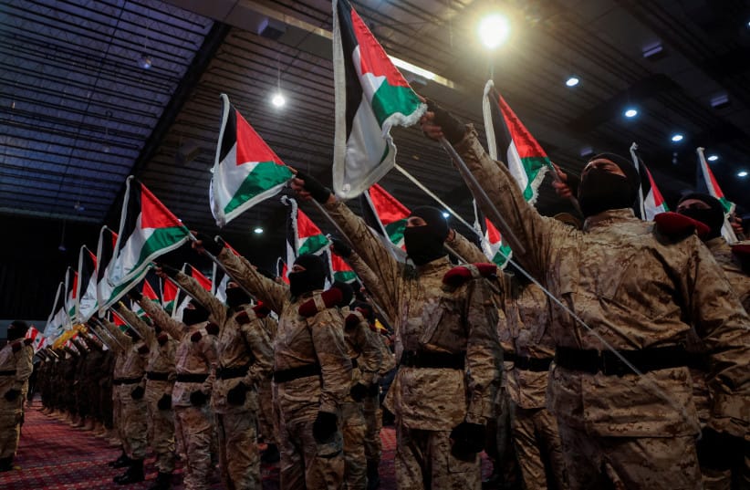 Hezbollah members parade during a rally marking al-Quds Day, (Jerusalem Day) in Beirut's southern suburbs, Lebanon April 5, 2024.