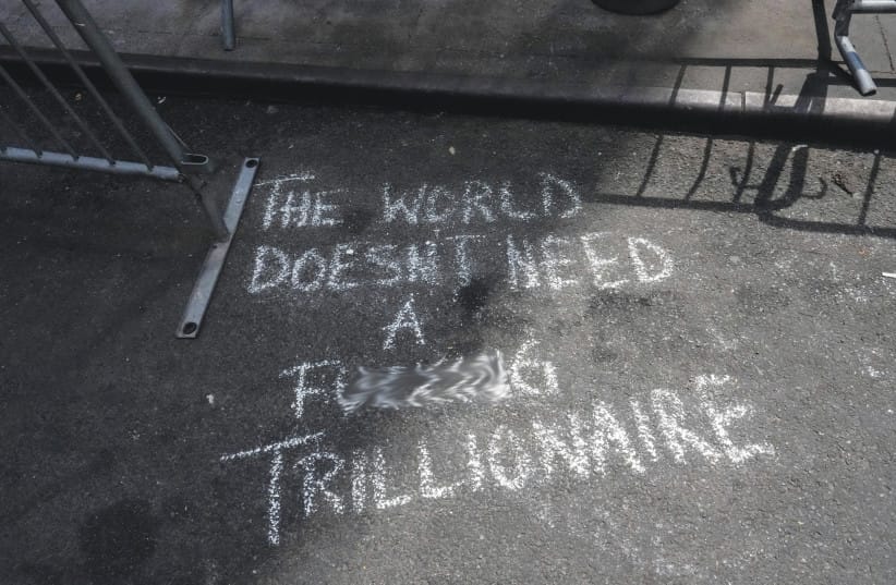 GRAFFITI OUTSIDE NASDAQ that same day.