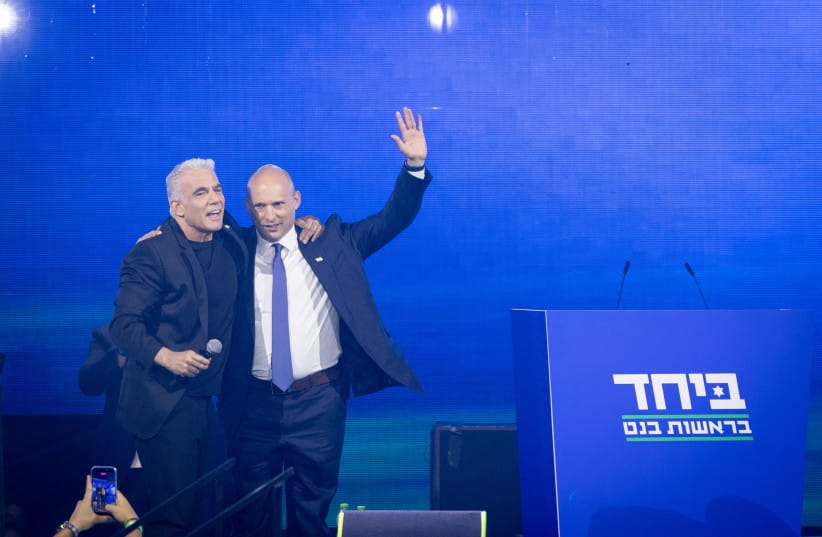 Opposition Leader Yair Lapid and former Prime Minister Naftali Bennett attend an election event for the joint list “Together” ahead of the upcoming elections, in Tel Aviv, central Israel, May 12, 2026. The list is set to be led by Bennett.