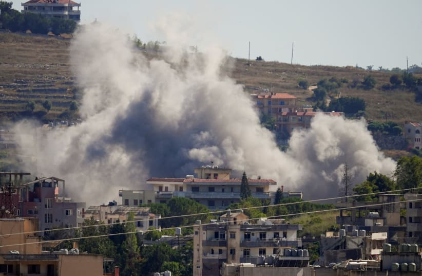 Smoke billows from southern Lebanon following an Israeli strike, as seen from Nabatieh, southern Lebanon, June 19, 2026.