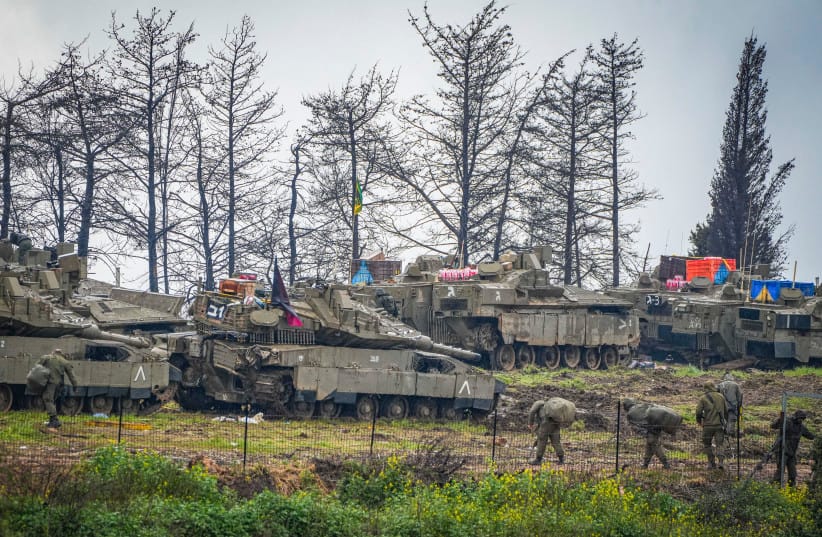 Israeli army tanks at a staging area near the Israeli-Lebanese border amid the ongoing war with Iran and Hezbollah, March 15, 2026.
