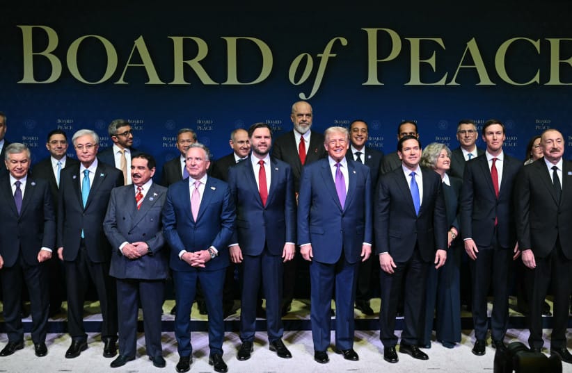 US President Donald Trump (C), flanked by US Vice President JD Vance (L) and US Secretary of State Marco Rubio (R), joins leaders for a group photo during the inaugural meeting of the ''Board of Peace'' at the US Institute of Peace in Washington, DC, on February 19, 2026.