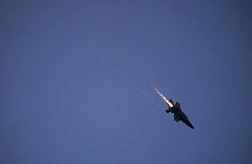 n F-35 lights its afterburner as it does a flyover during a rally to kick off the Great American State Fair on the National Mall on June 24, 2026 in Washington, DC.