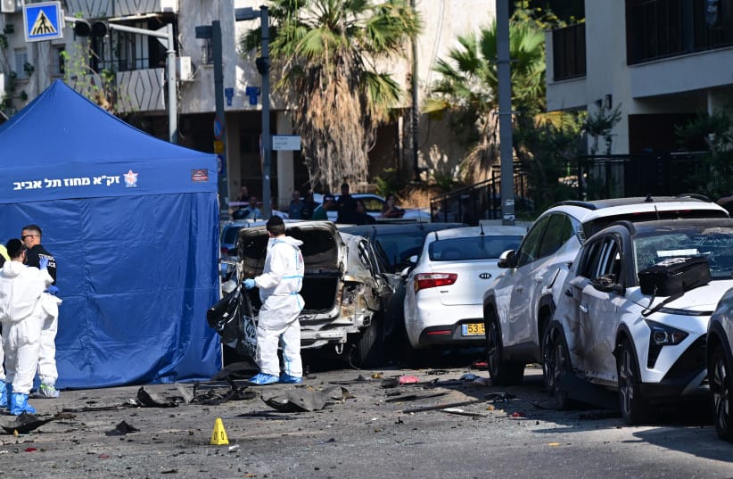 ZAKA search and rescue staff clear up after a car exploded in Jaffa, June 28, 2026.