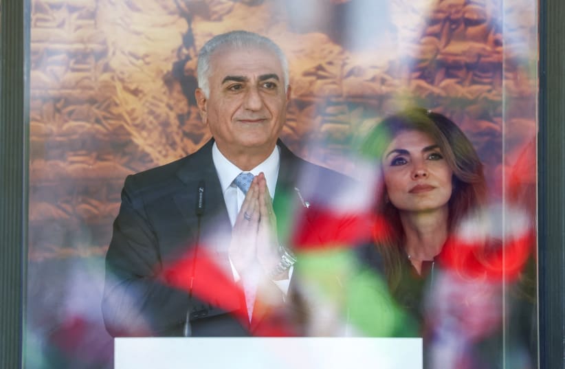 Iranian Crown Prince Reza Pahlavi and his wife Yasmine Pahlavi attend a demonstration by Iranian pro-monarchy supporters near the Reichstag building in Berlin, Germany, April 23, 2026. 