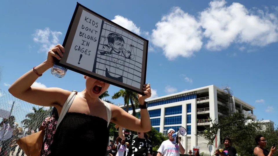 Kathleen Larraz of Miami, at a protest by the Florida-based a minority youth-activist group Dream Defenders against the Geo Group's temporary headquarters in Boca Raton in August 2018. - Carline Jean /South Florida Sun-Sentinel/AP