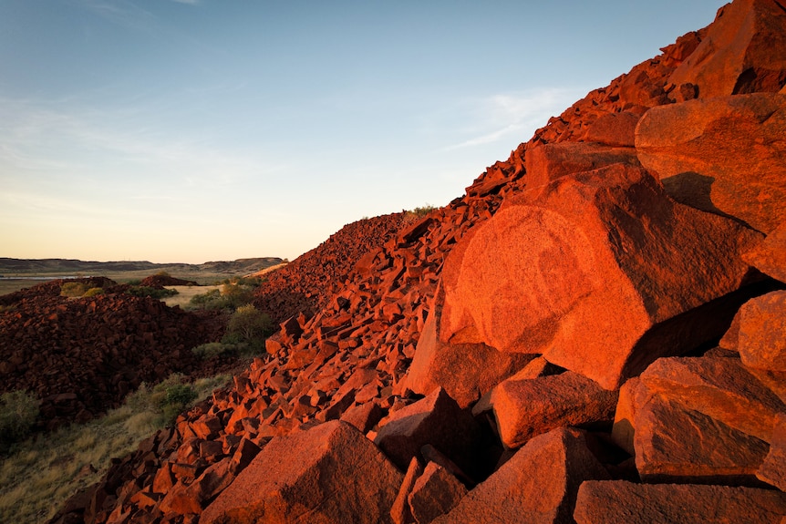 Red rocks depicting rock art
