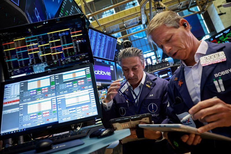 Wall St futures slip as tech losses mount ahead of key inflation data