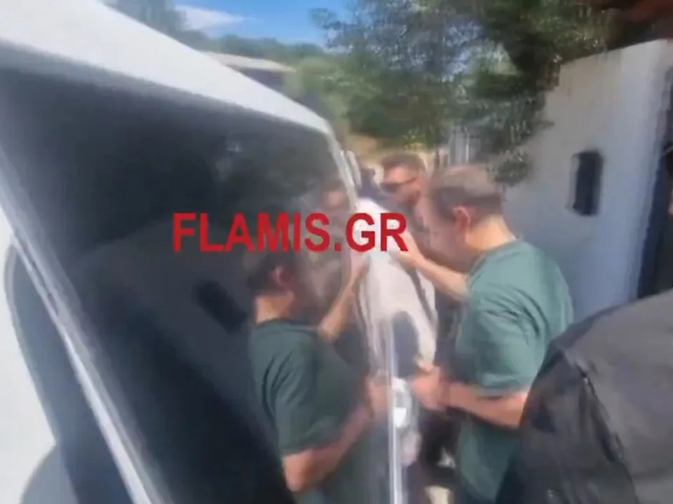 James Dalamangas is arrested in Greece. Picture: Flamis.Gr