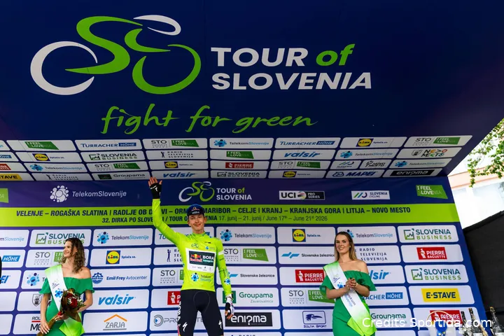 Florian Lipowitz stands on the podium in the leader's jersey at the 2026 Tour of Slovenia