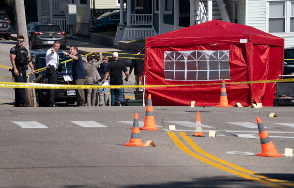 The scene on Pool Street where a man was reportedly killed in a shooting involving U.S. Immigration and Customs Enforcement agents, Monday, July 13, 2026 in Biddeford, Maine. (Gregory Rec/Portland Press Herald via AP)