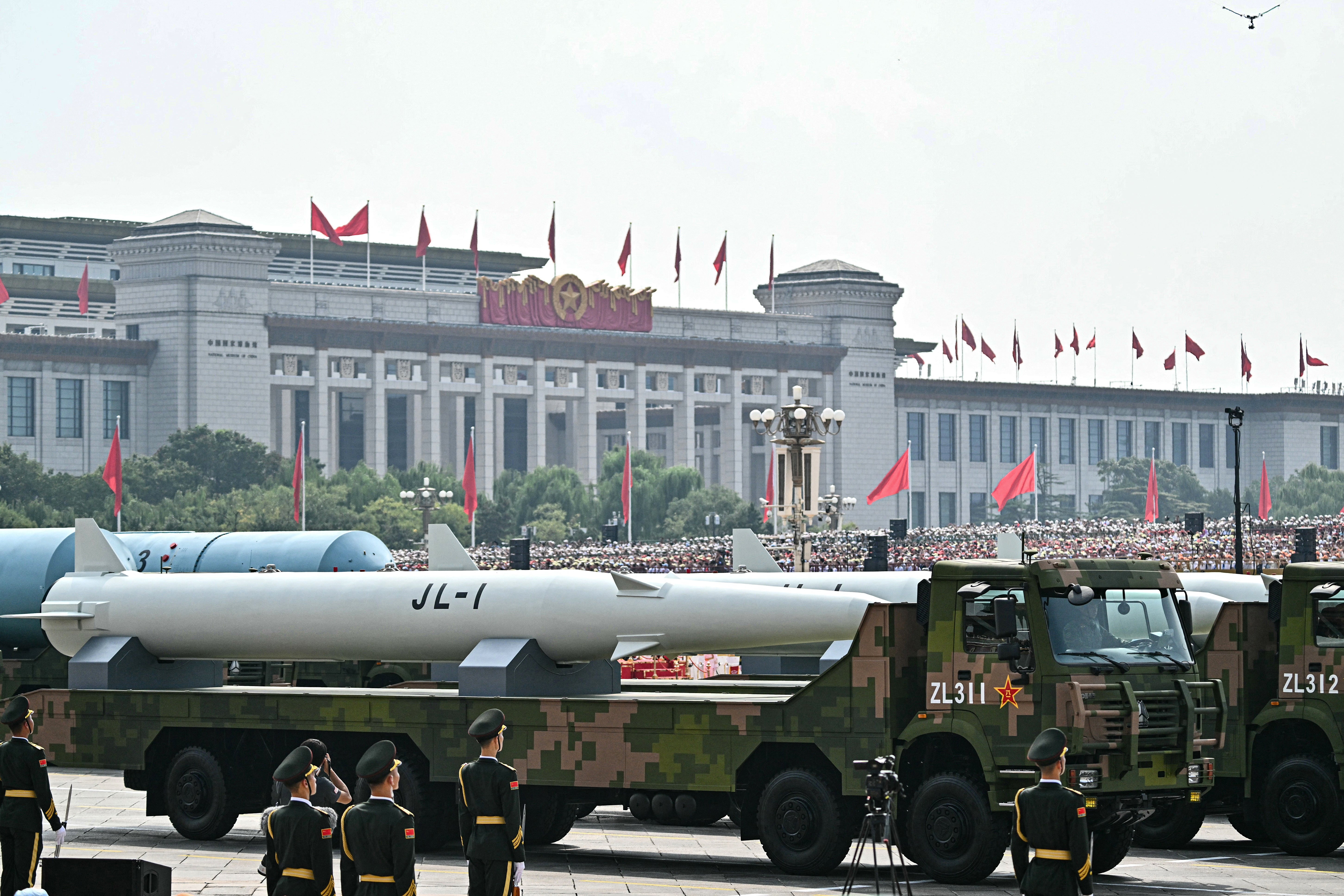 The JL-1 first generation nuclear submarine-launched ballistic missile is seen during a military parade
