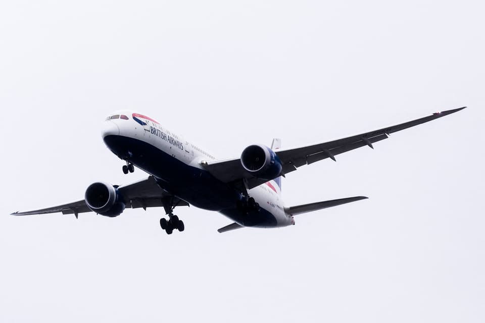 <p>A British Airways plane flies into Heathrow Airport in west London on February 27, 2026. IAG, the owner of British Airways and Spanish carrier Iberia, said February 17, that its net profit jumped 22 percent last year thanks largely to lower fuel costs. Profit after tax rose to 3.34 billion euros ($4.49 billion) in 2025 compared with 2.73 billion euros one year earlier. (Photo by Brook Mitchell / AFP via Getty Images)</p>