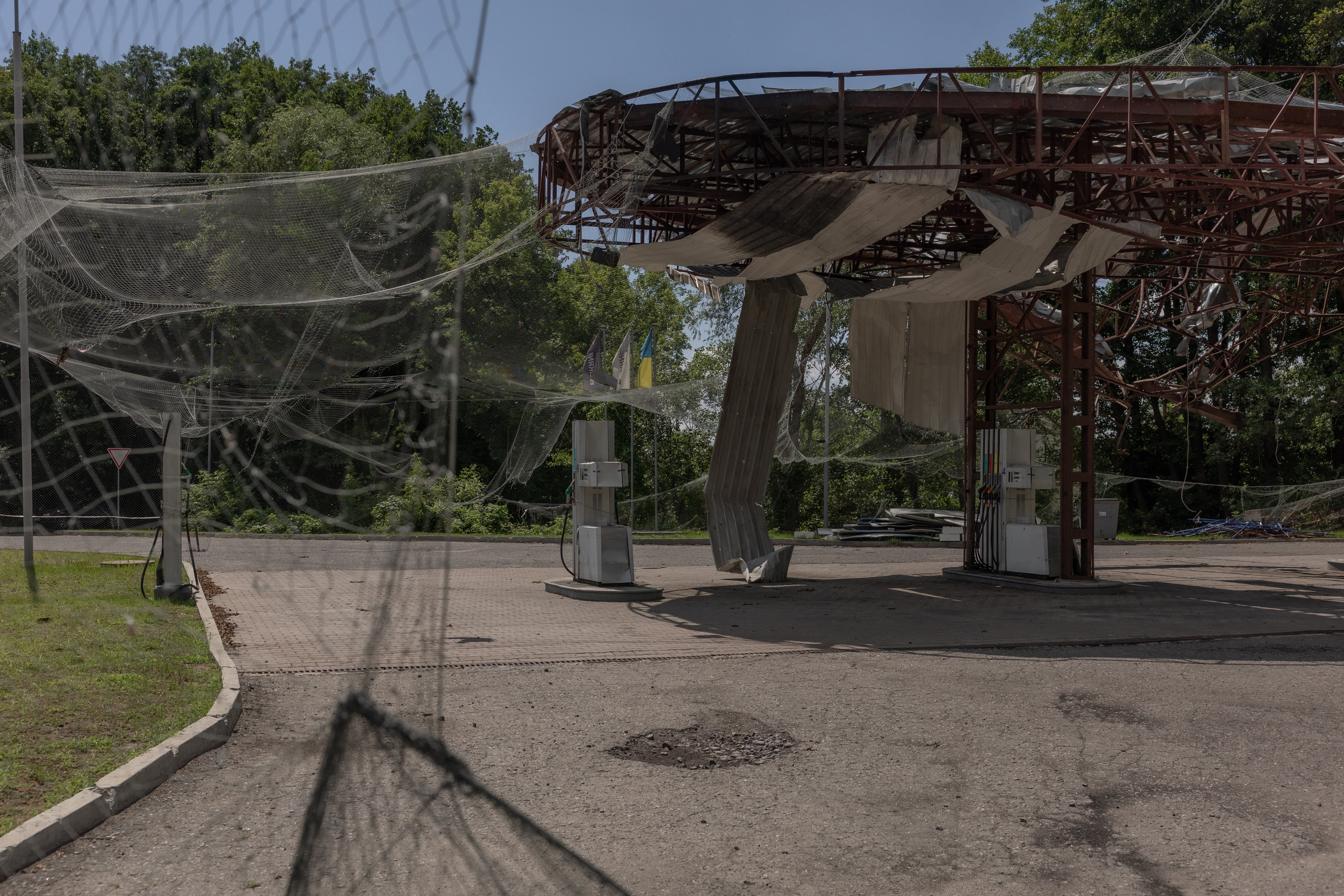 - This photograph shows a petrol station destroyed in an air attack in the town of Izium, in the eastern Kharkiv region