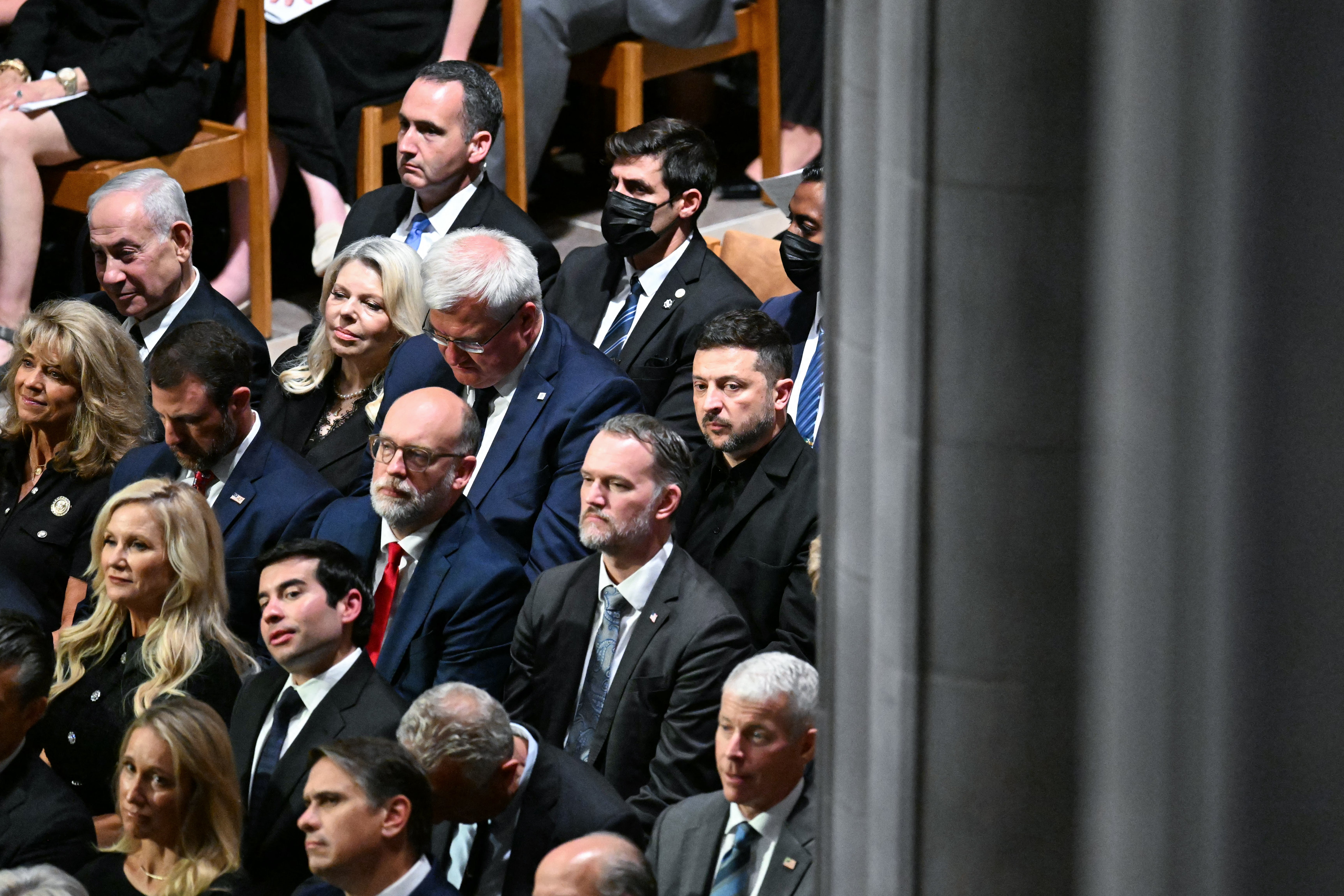 Israeli prime minister Benjamin Netanyahu (L) and Ukrainian president Volodymyr Zelensky attend the funeral service for US senator Lindsey Graham at the Washington National Cathedral in Washington, DC
