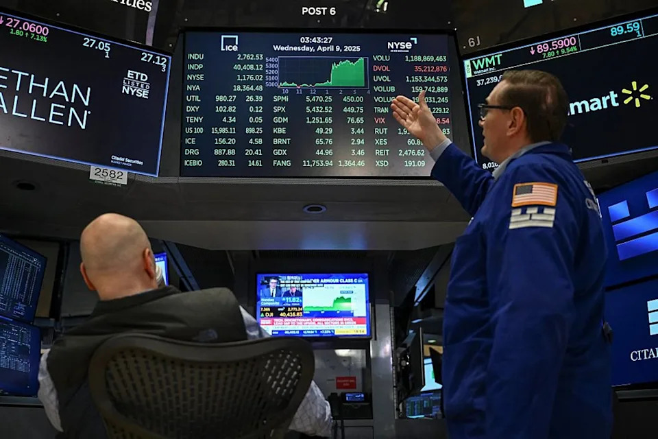 Traders work on the floor of the New York Stock Exchange on April 9, 2025, after Trump announced he was pausing the trade tariffs for 90 days (AFP/Getty)