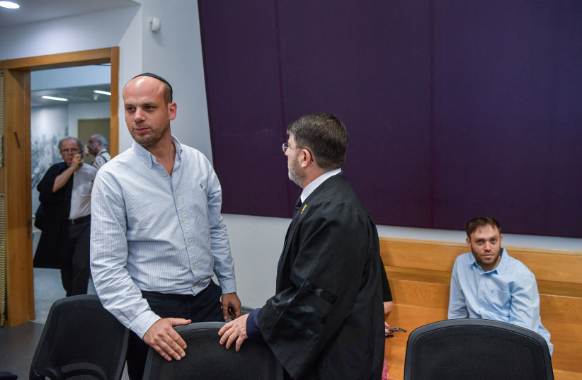Eli Feldstein and Aaron “Ari” Rosenfeld, two of the suspects in the so-called Qatargate investigation arrives for a court hearing at the Tel Aviv District Court on July 15, 2025.
