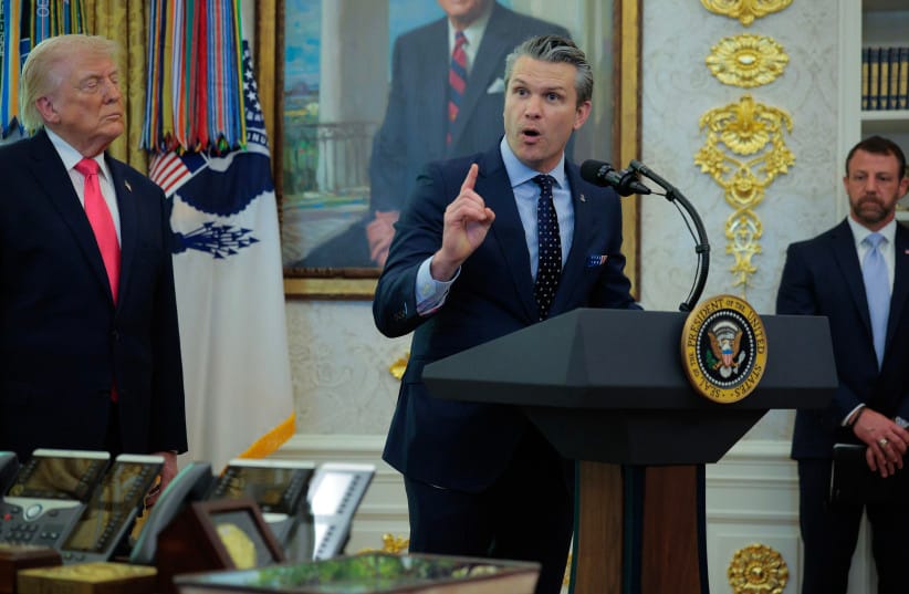 US Secretary of Defense Pete Hegseth talks about the war in Iran as President Donald Trump hosts the swearing-in ceremony for US Secretary of the Department of Homeland Security Markwayne Mullin (R) in the Oval Office at the White House on March 2.