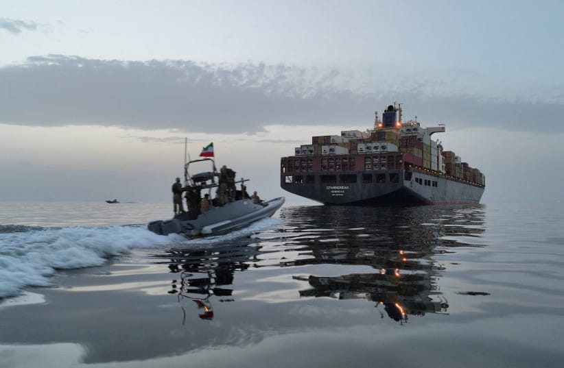 The Epaminondas ship is seen during seizure by the Islamic Revolutionary Guard Corps (IRGC) in the Strait of Hormuz, Iran, in this image obtained by Reuters on April 24, 2026. (credit: Meysam Mirzadeh/Tasnim/WANA