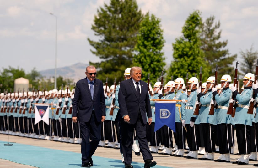US President Donald Trump walks with Turkish President Recep Tayyip Erdogan during a formal arrival at the Bestepe Presidential Compound at the NATO summit in Ankara, Turkey, Tuesday, July 7, 2026.