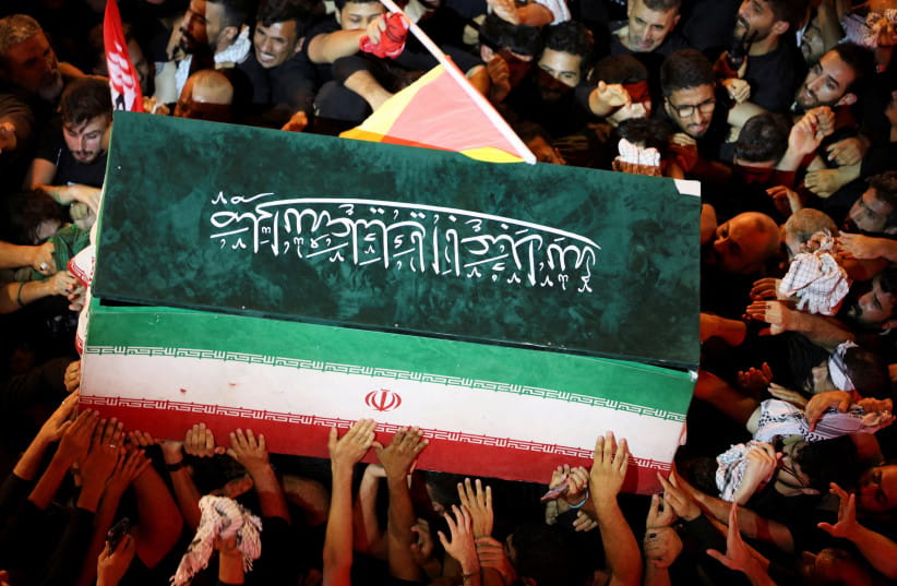 People carry the coffin of Iran's late Supreme Leader Ayatollah Ali Khamenei, who was killed on February 28 in Israeli and U.S. airstrikes, during his funeral procession, in Karbala, Iraq, July 9, 2026.