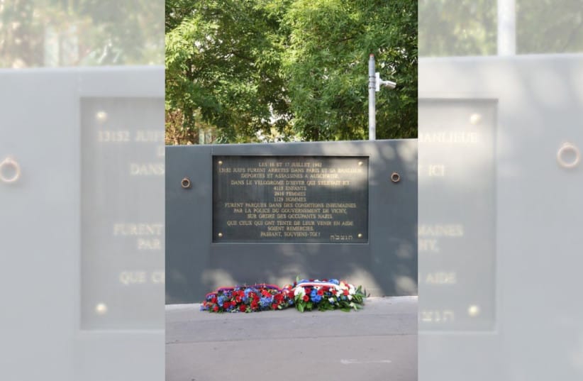 A commemorative plaque honoring a couple recognized as Righteous Among the Nations and their daughter in Paris.